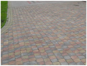 ułożona kostka brukowa, realizacja usługi brukarskiej